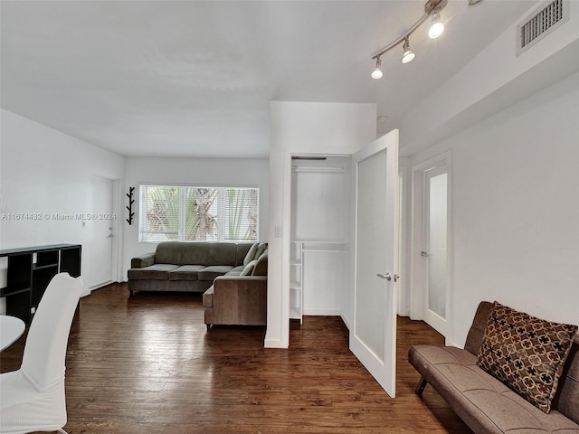 living room with dark hardwood / wood-style floors