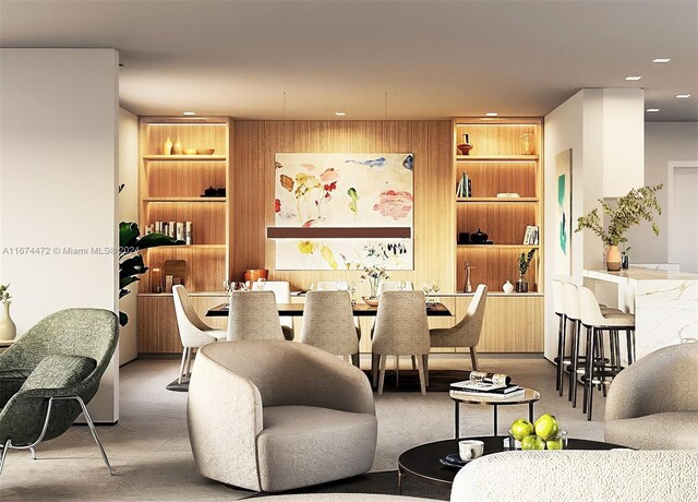 145 S Prospect Dr, Coral Gables, FL 33133 - dining area with built in shelves, carpet, and recessed lighting