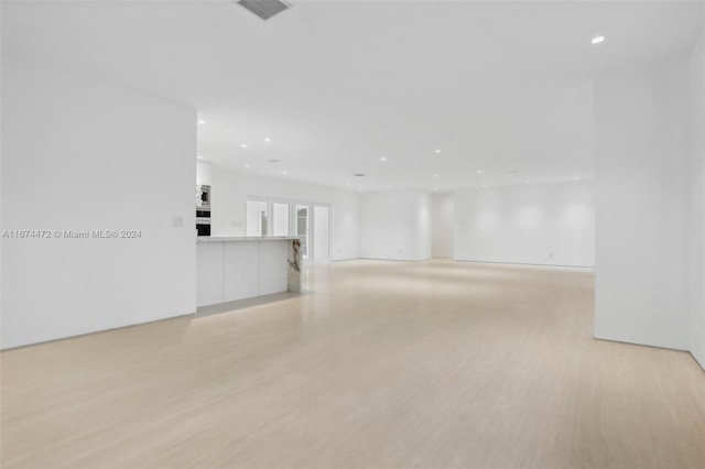 empty room with light wood-type flooring