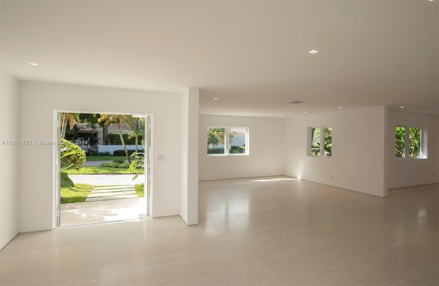 unfurnished room featuring light wood-type flooring