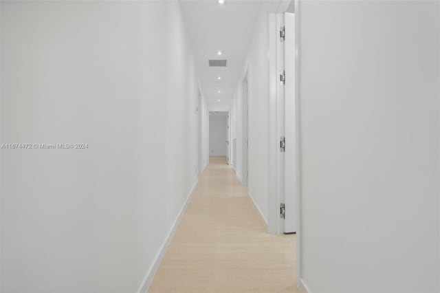 hall featuring light hardwood / wood-style floors