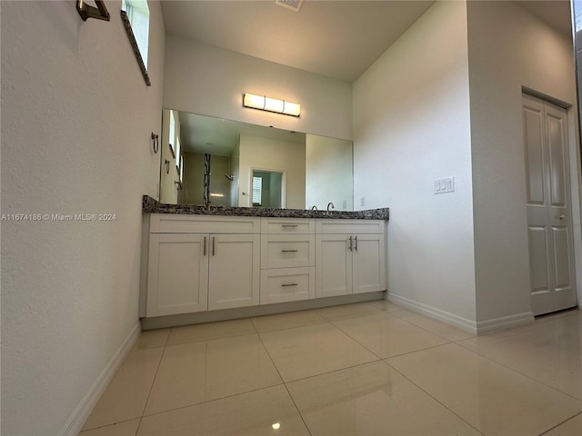 bathroom featuring vanity and tile patterned floors