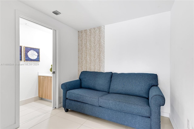 sitting room featuring light tile patterned floors