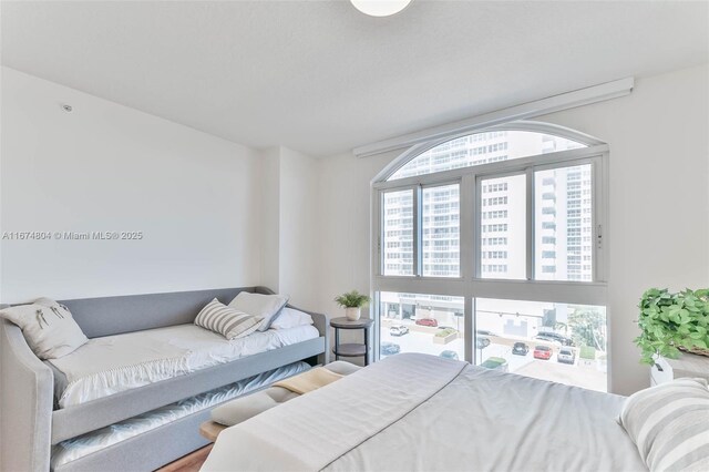 bedroom featuring hardwood / wood-style flooring