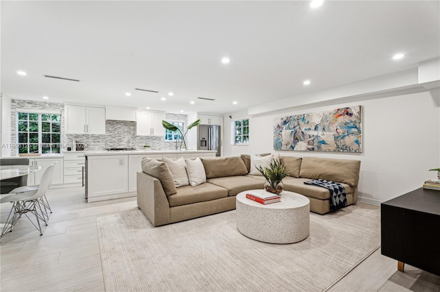 living room with light hardwood / wood-style floors