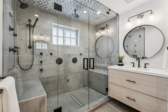 bathroom featuring vanity and walk in shower