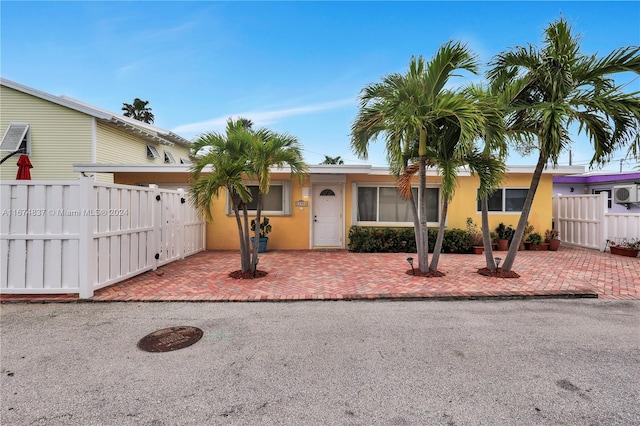 view of front of home featuring a patio