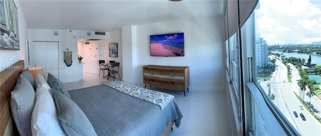 bedroom featuring multiple windows