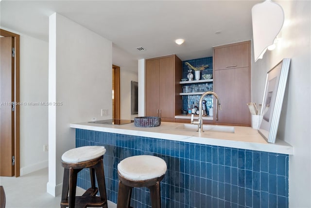 bar featuring sink