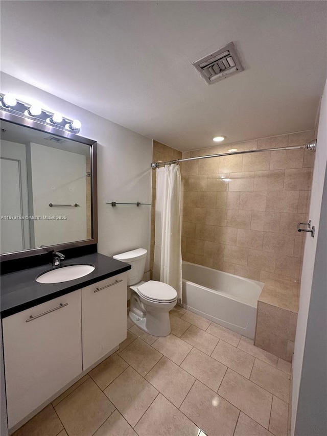 full bathroom with shower / tub combo with curtain, vanity, toilet, and tile patterned flooring