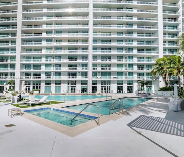 view of pool featuring a patio