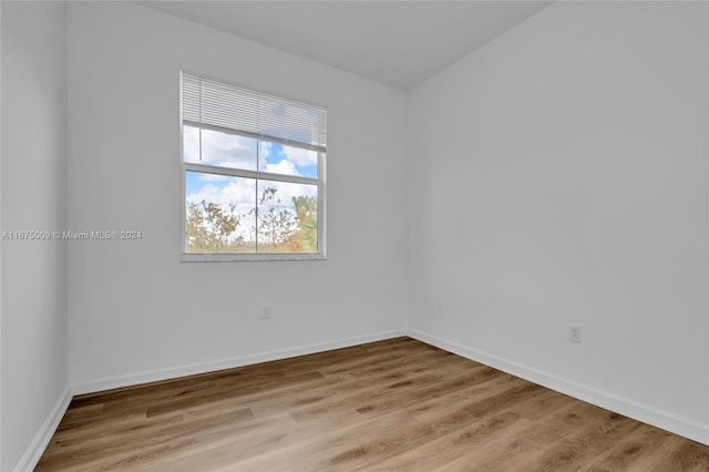 unfurnished room featuring light hardwood / wood-style flooring