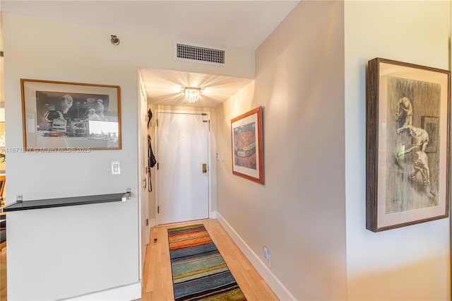 doorway to outside featuring hardwood / wood-style floors