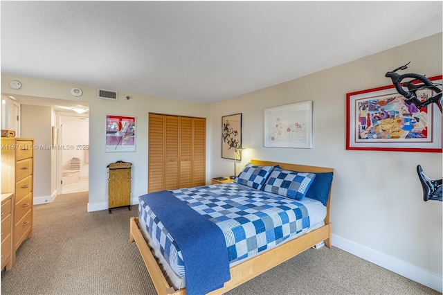 carpeted bedroom with a closet