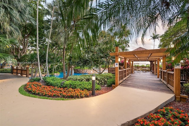 view of home's community featuring a pergola