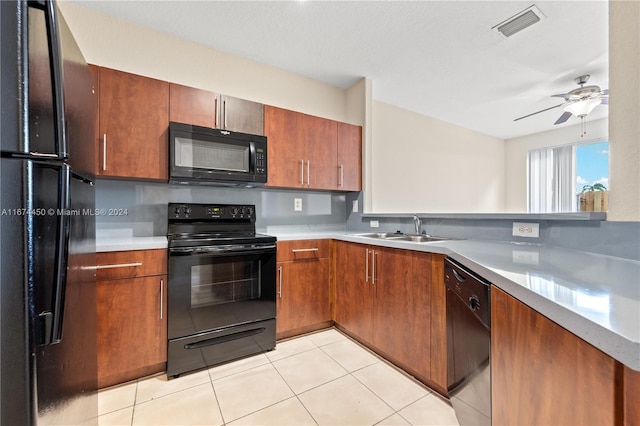 kitchen with black appliances, sink, light tile patterned floors, and ceiling fan