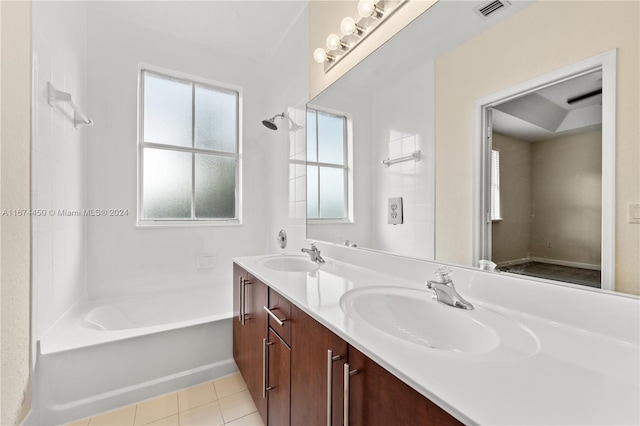 bathroom featuring shower / bathing tub combination, vanity, and tile patterned flooring