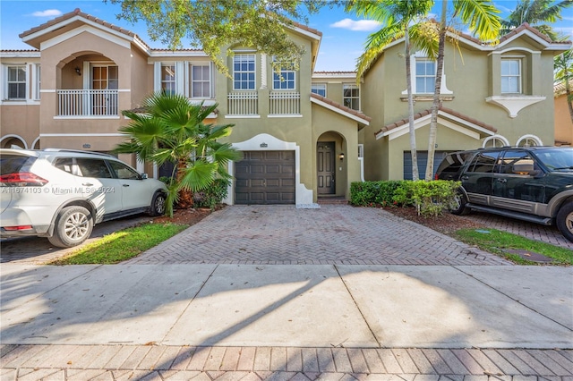 view of front of property with a garage