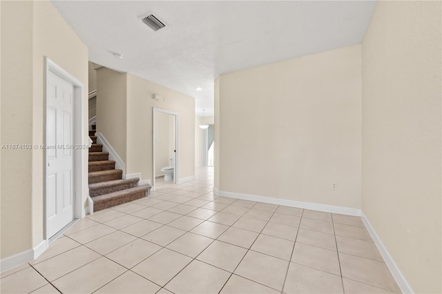 view of tiled spare room