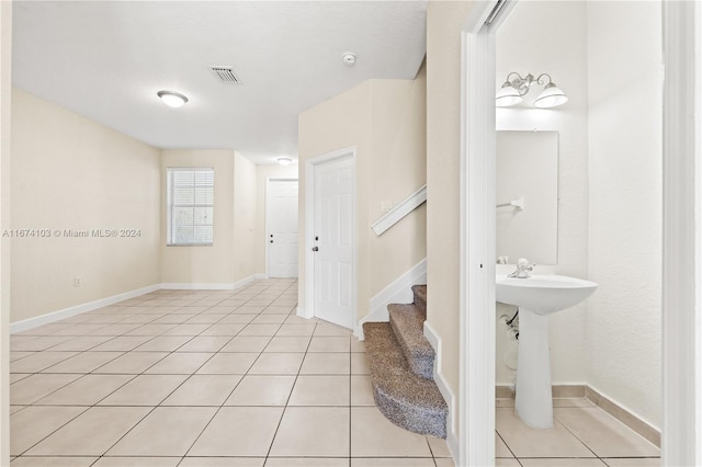 bathroom with tile patterned flooring