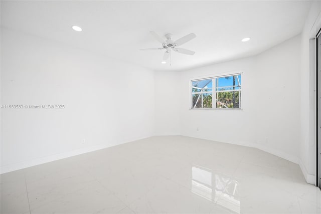 empty room featuring ceiling fan