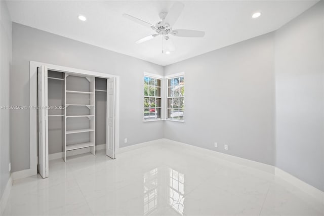 bedroom with ceiling fan and a closet