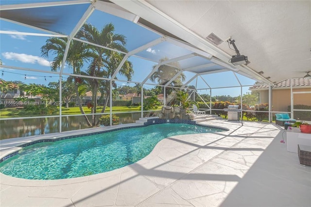 view of pool with glass enclosure, area for grilling, a water view, and a patio