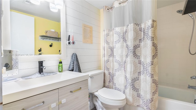 full bathroom with vanity, toilet, wood walls, and shower / bath combination with curtain