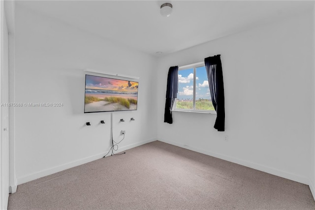 empty room featuring carpet flooring