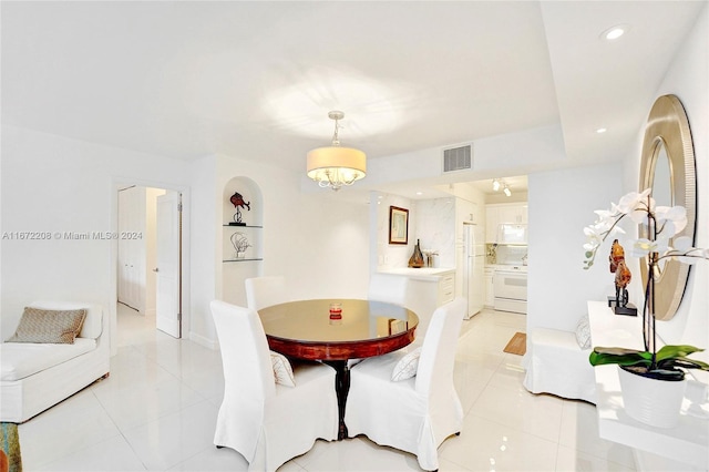 dining room with light tile patterned flooring