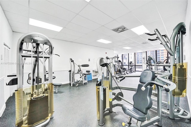 workout area with a drop ceiling