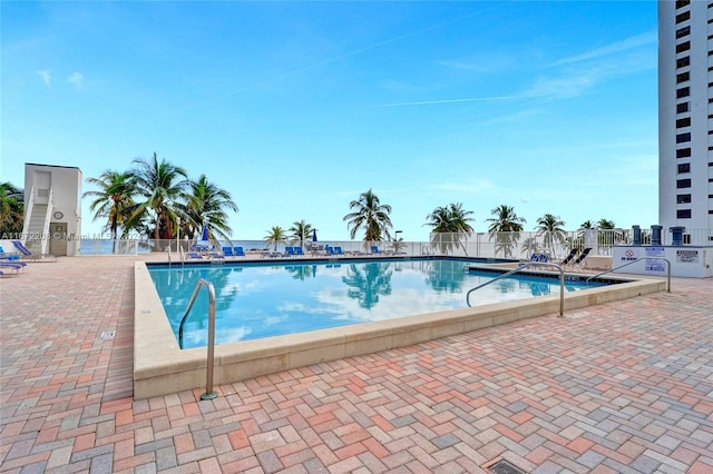 view of pool featuring a patio