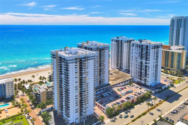 aerial view featuring a beach view and a water view