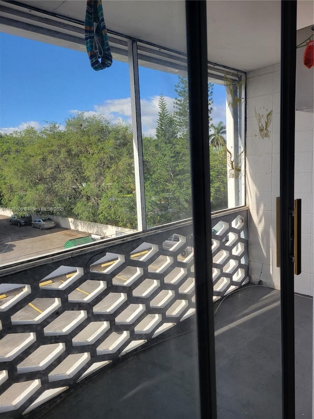 unfurnished sunroom with a healthy amount of sunlight