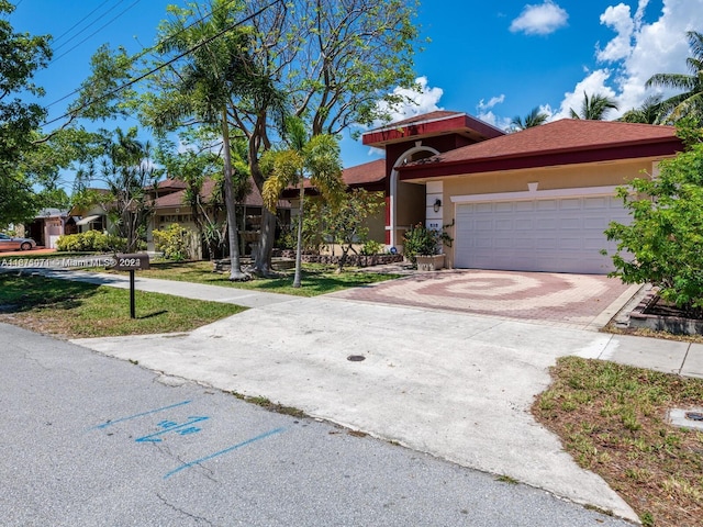 view of front of property featuring a garage