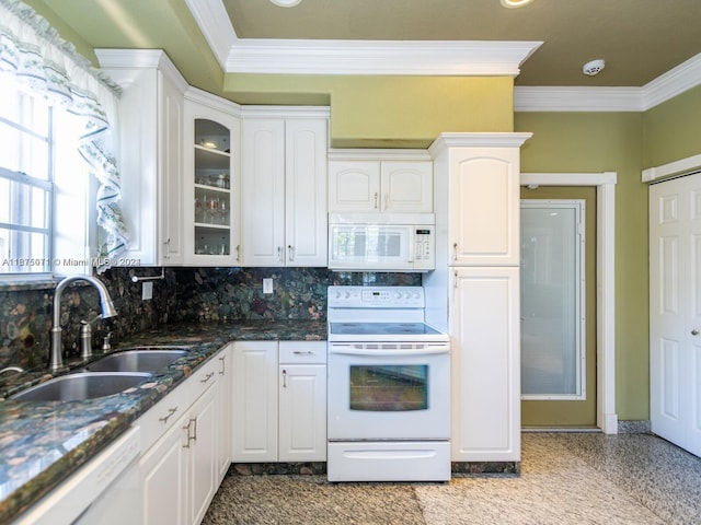 kitchen featuring ornamental molding, white appliances, sink, and white cabinets