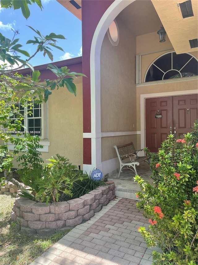232 SW 7th Ave, Hallandale Beach, FL 33009 - view of exterior entry with stucco siding