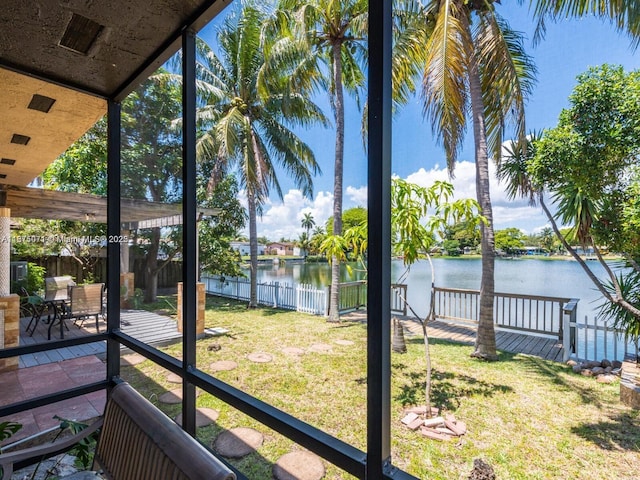 232 SW 7th Ave, Hallandale Beach, FL 33009 - unfurnished sunroom featuring a water view