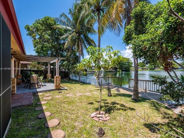 232 SW 7th Ave, Hallandale Beach, FL 33009 - view of yard featuring a deck with water view