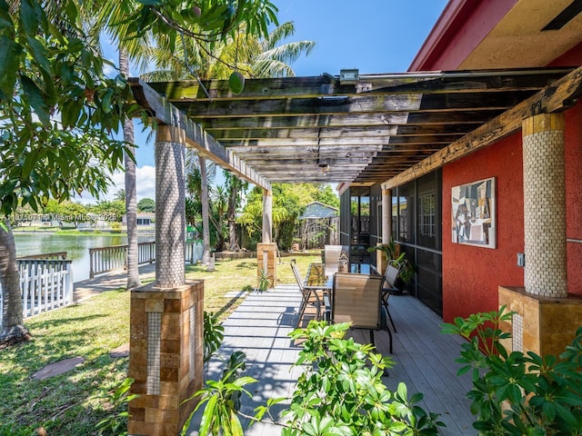 232 SW 7th Ave, Hallandale Beach, FL 33009 - deck with outdoor dining space, a water view, and a pergola