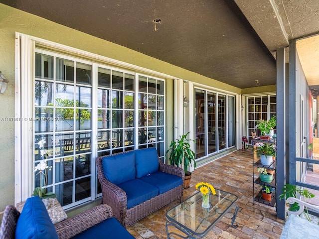 232 SW 7th Ave, Hallandale Beach, FL 33009 - view of patio with an outdoor living space