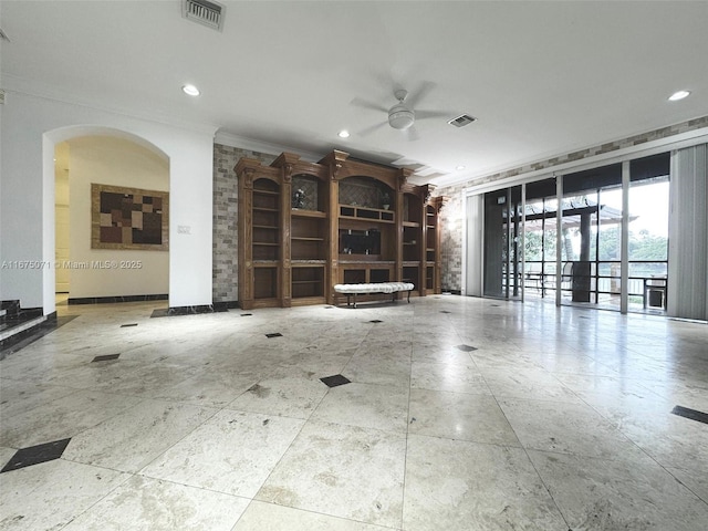 232 SW 7th Ave, Hallandale Beach, FL 33009 - unfurnished living room featuring ornamental molding, ceiling fan, recessed lighting, arched walkways, and baseboards