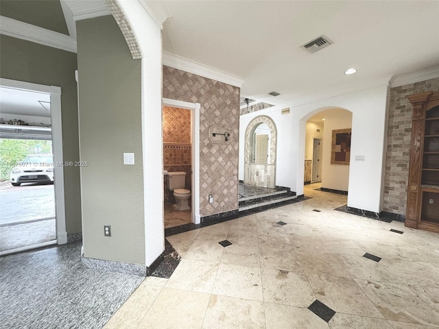 232 SW 7th Ave, Hallandale Beach, FL 33009 - bathroom featuring crown molding, baseboards, and toilet