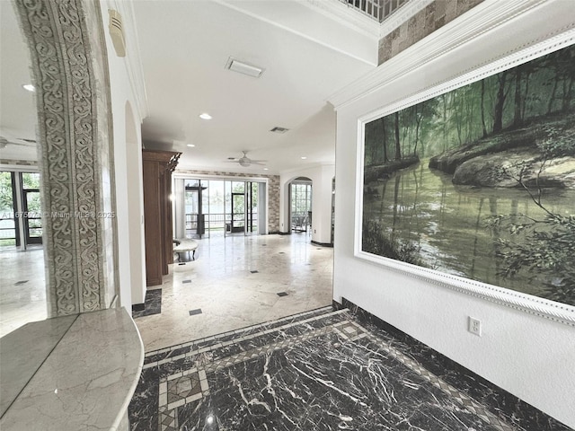 232 SW 7th Ave, Hallandale Beach, FL 33009 - hall featuring arched walkways, ornamental molding, recessed lighting, marble tiled flooring, and inlaid floor details