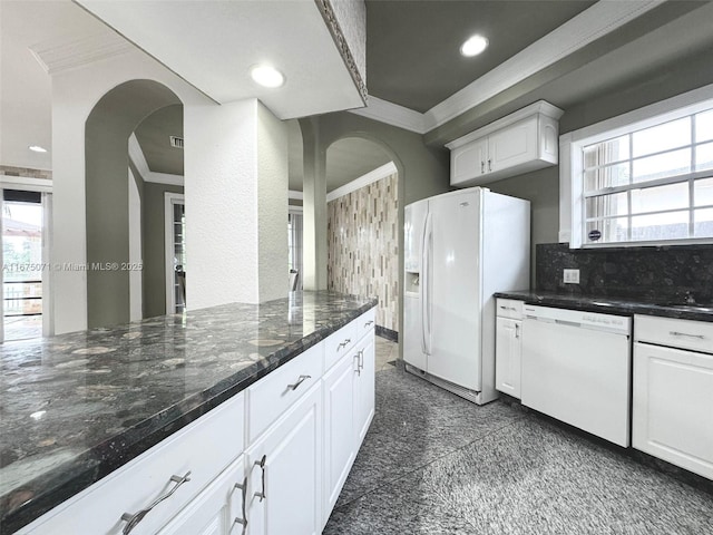 232 SW 7th Ave, Hallandale Beach, FL 33009 - kitchen with white appliances, granite floors, ornamental molding, white cabinets, and arched walkways