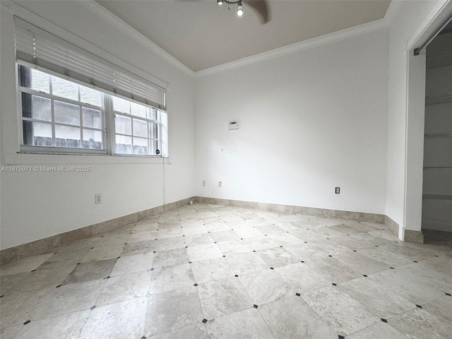 232 SW 7th Ave, Hallandale Beach, FL 33009 - spare room featuring crown molding and baseboards