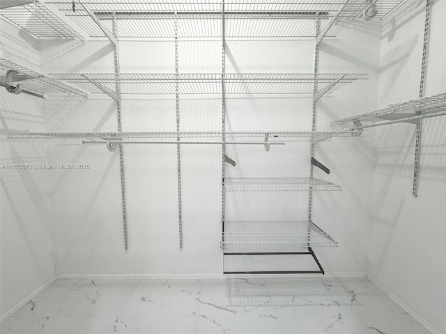 232 SW 7th Ave, Hallandale Beach, FL 33009 - walk in closet with marble look tiles