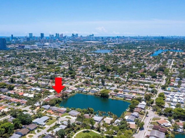 birds eye view of property featuring a water view