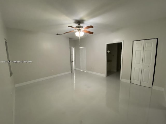 unfurnished bedroom featuring ceiling fan