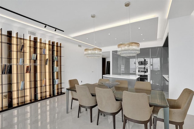 18975 Collins Ave Unit 2001, Sunny Isles Beach, FL 33160 - dining room featuring a chandelier